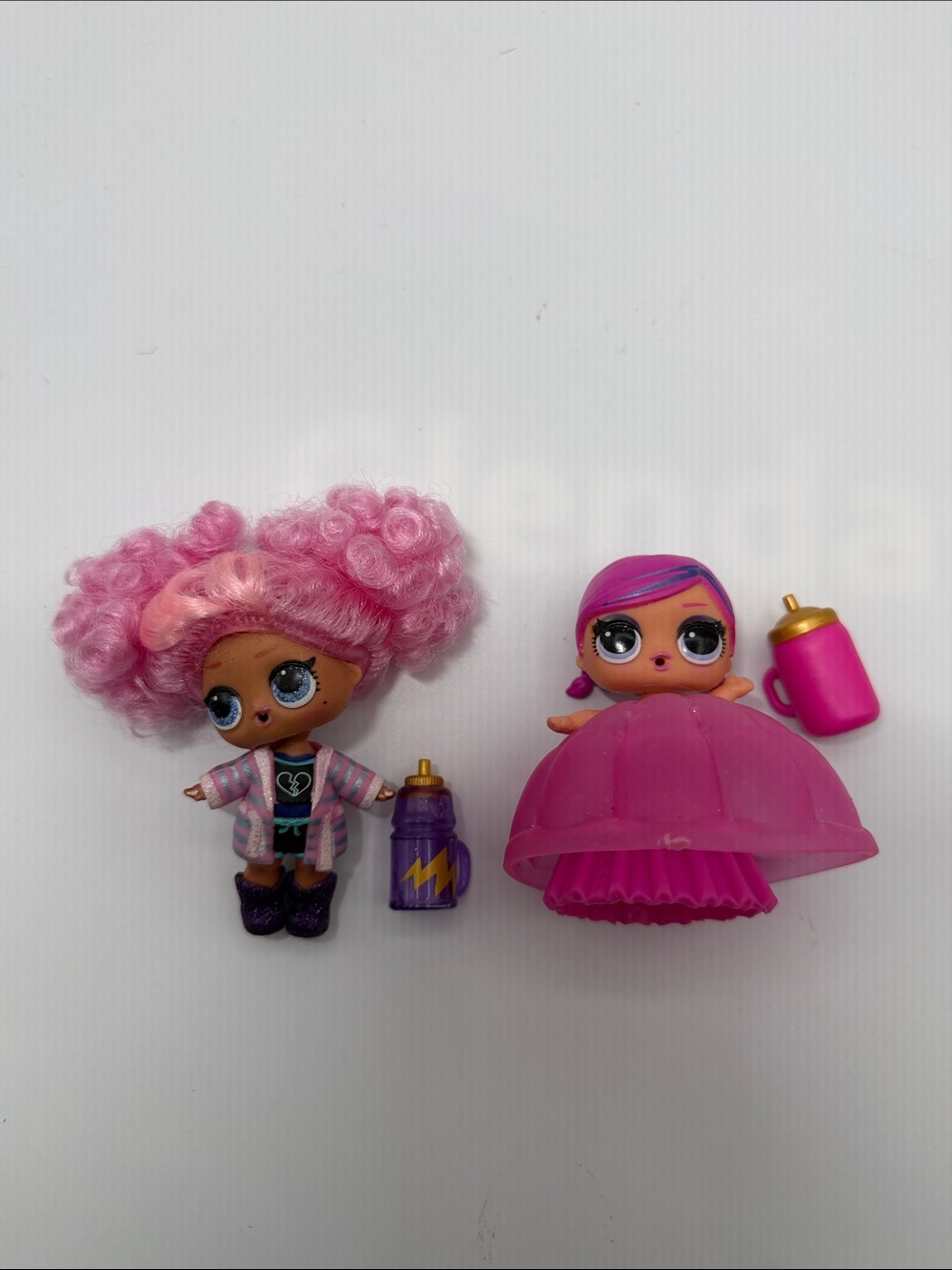 L.O.L. Surprise! Pink-Haired Dolls with Purple Bottle and Pink Dress